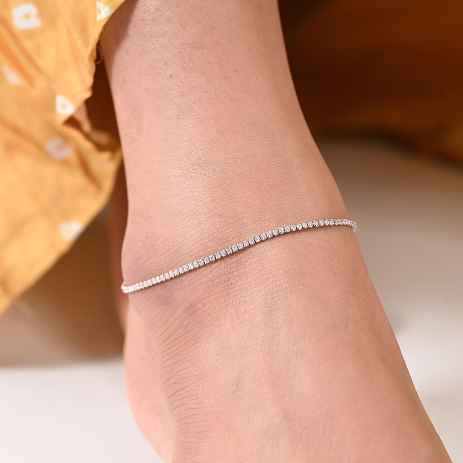 Crystal-lined minimalist anklets