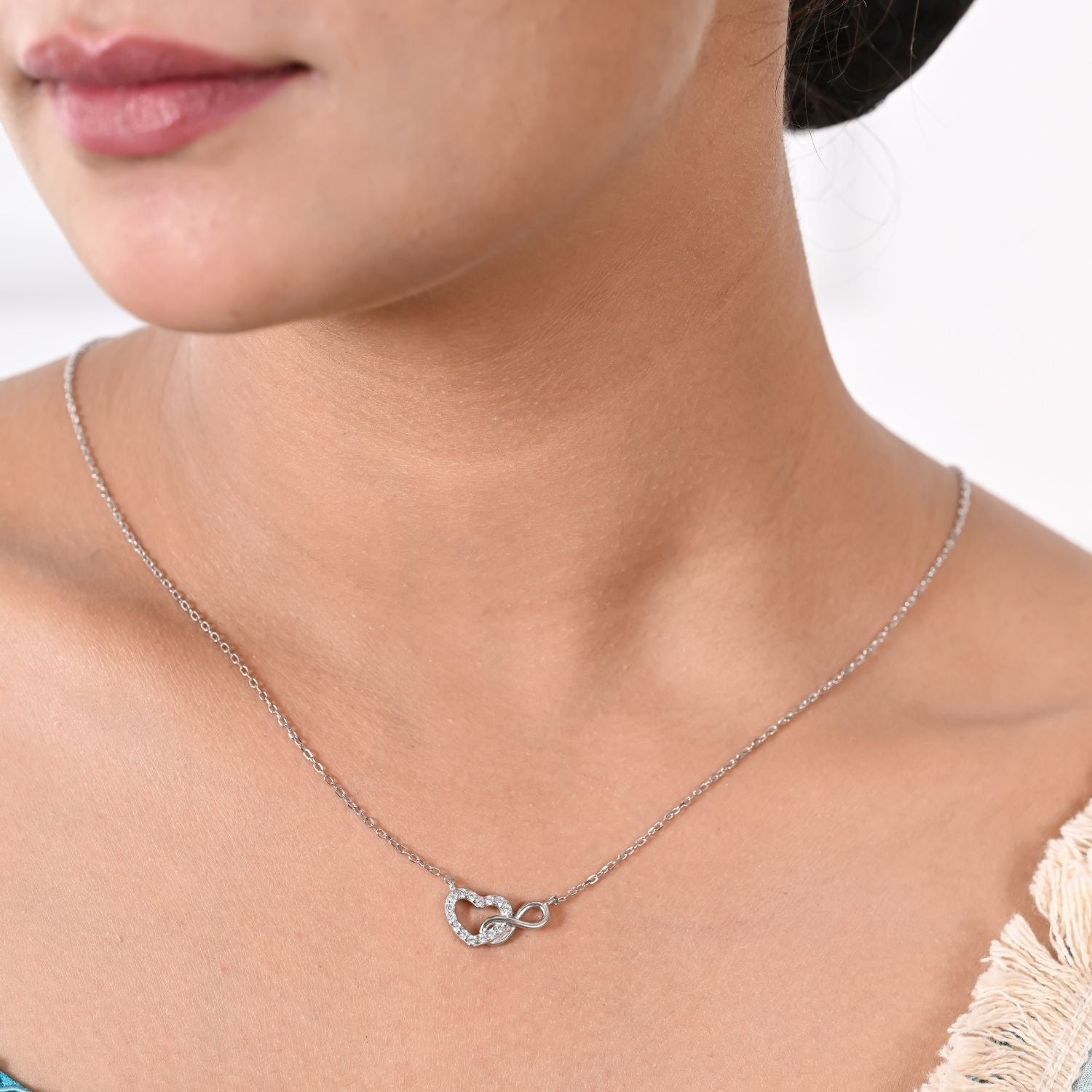 Heart-and-infinity pendant necklace