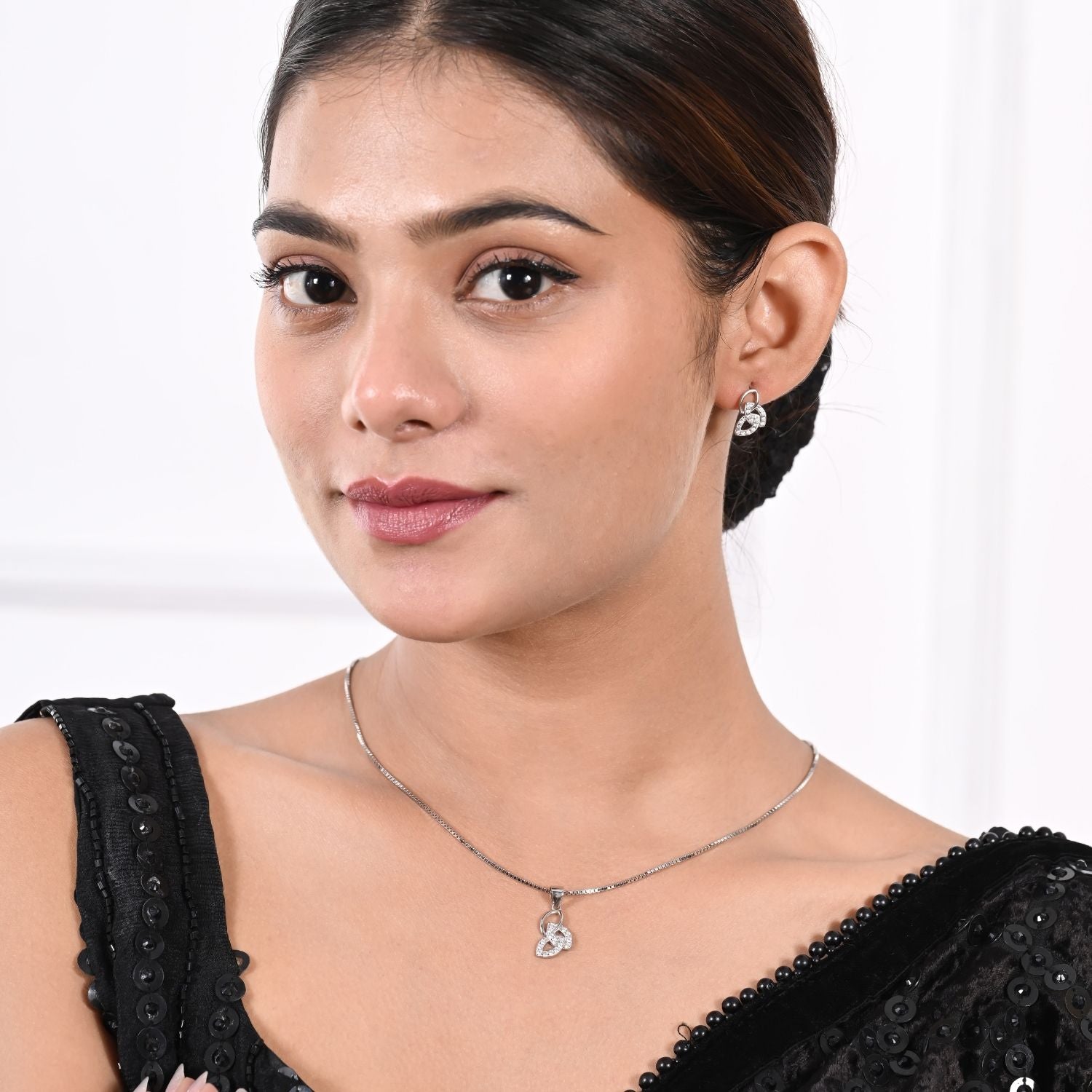 Heart-knot pendant and earring set