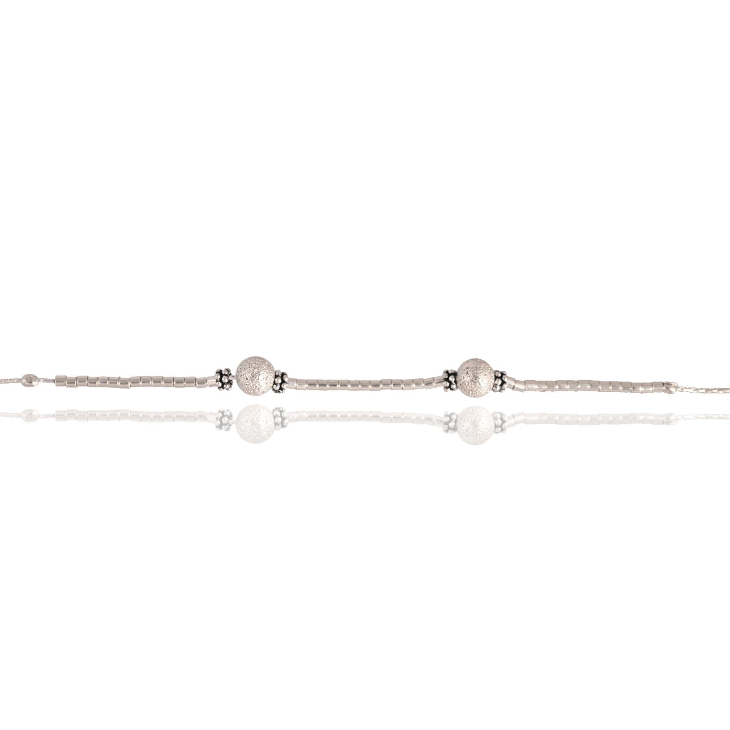 Traditional silver ball anklets