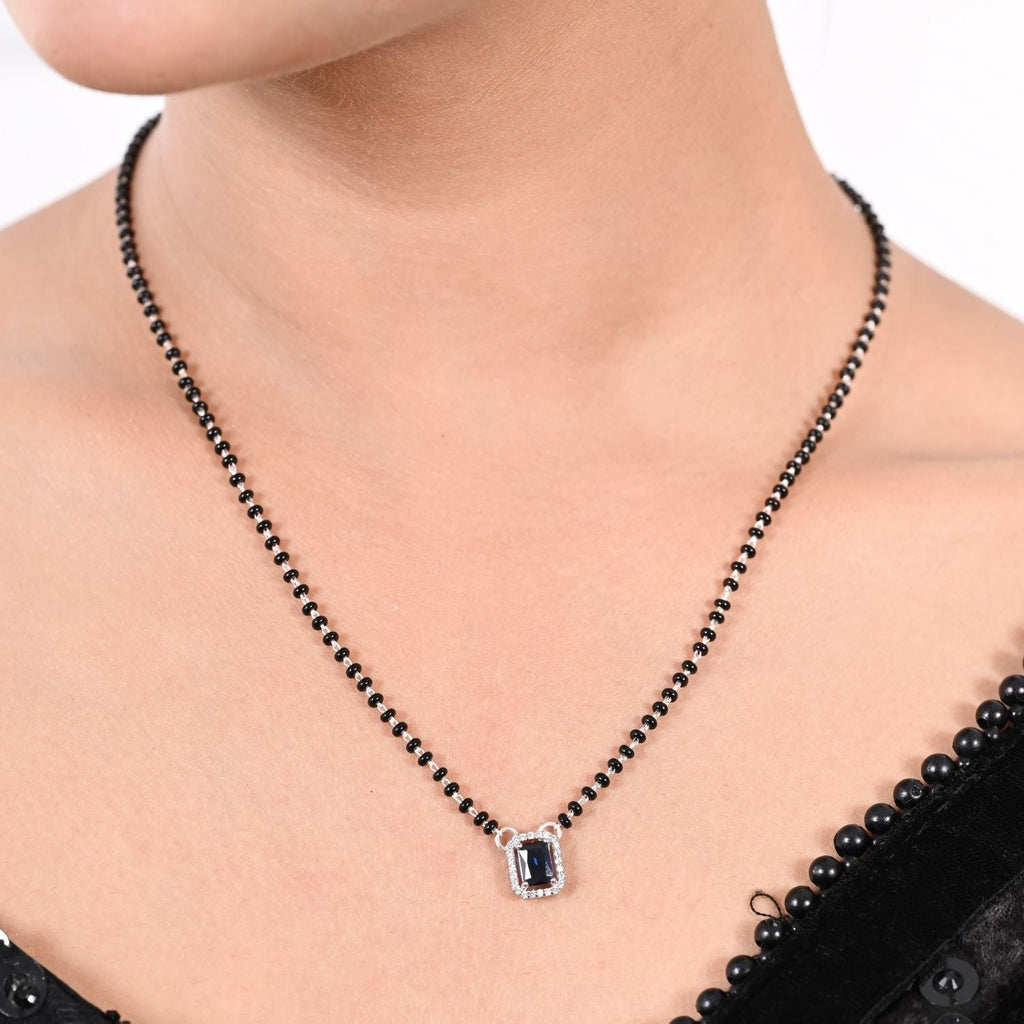 Black-bead Mangalsutra pendant set with matching earrings