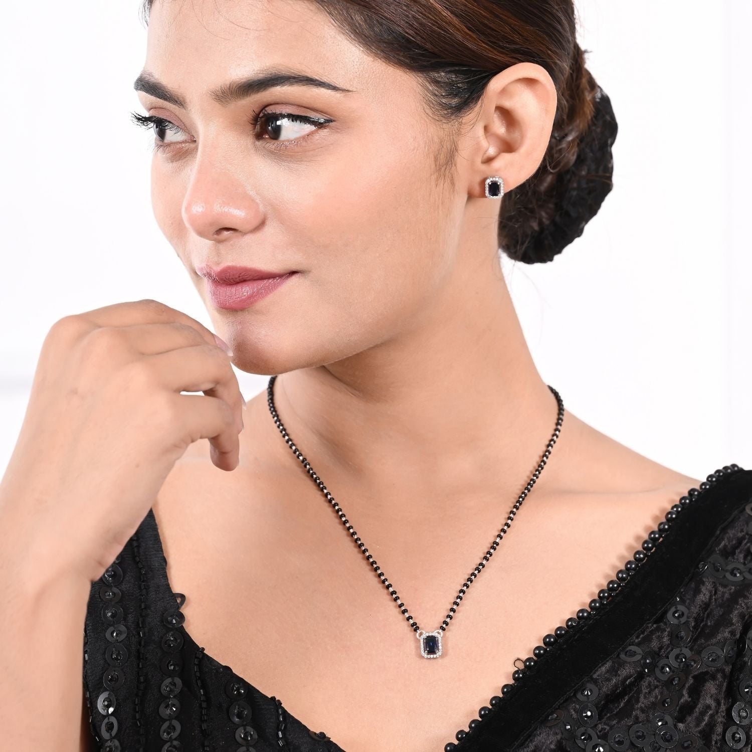 Black-bead Mangalsutra pendant set with matching earrings