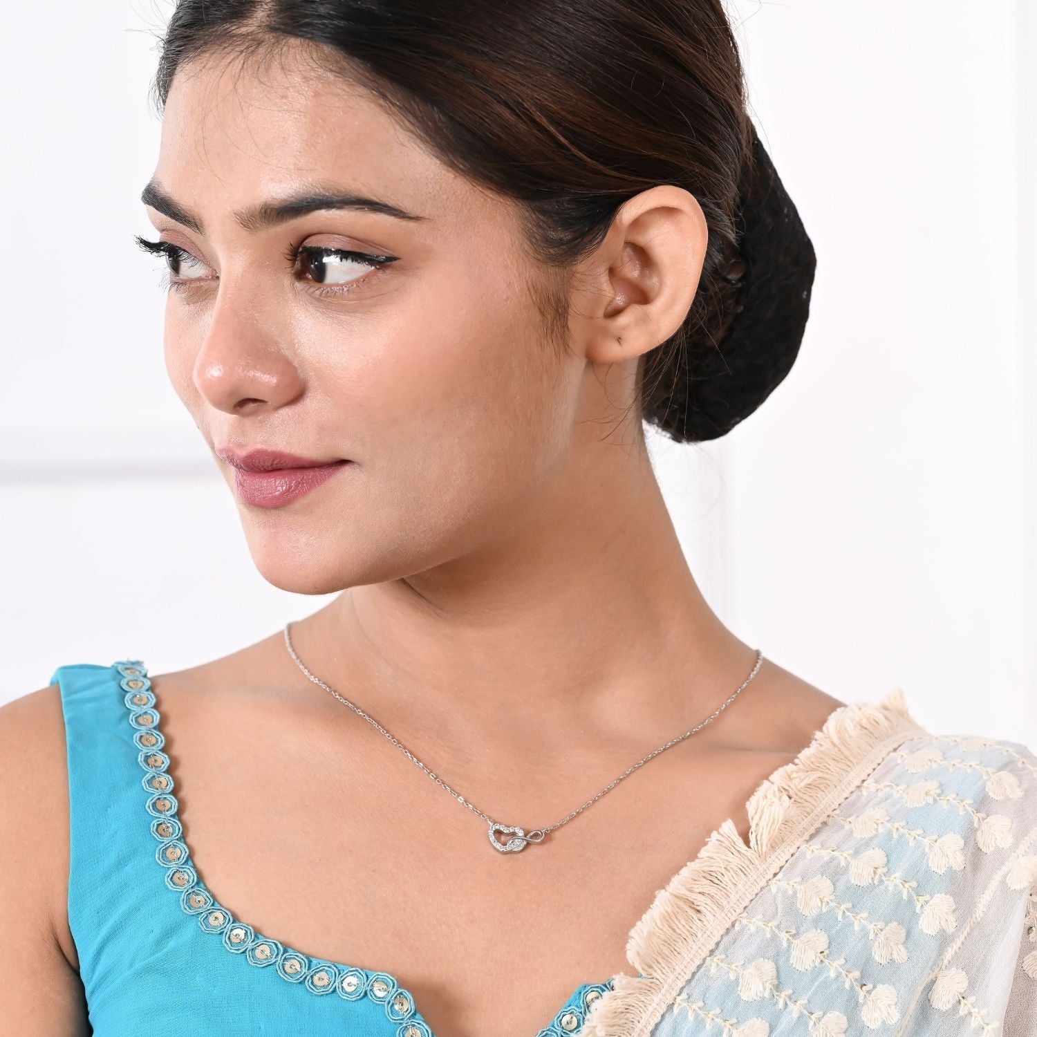 Heart-and-infinity pendant necklace