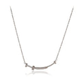 Barbell-inspired pendant necklace