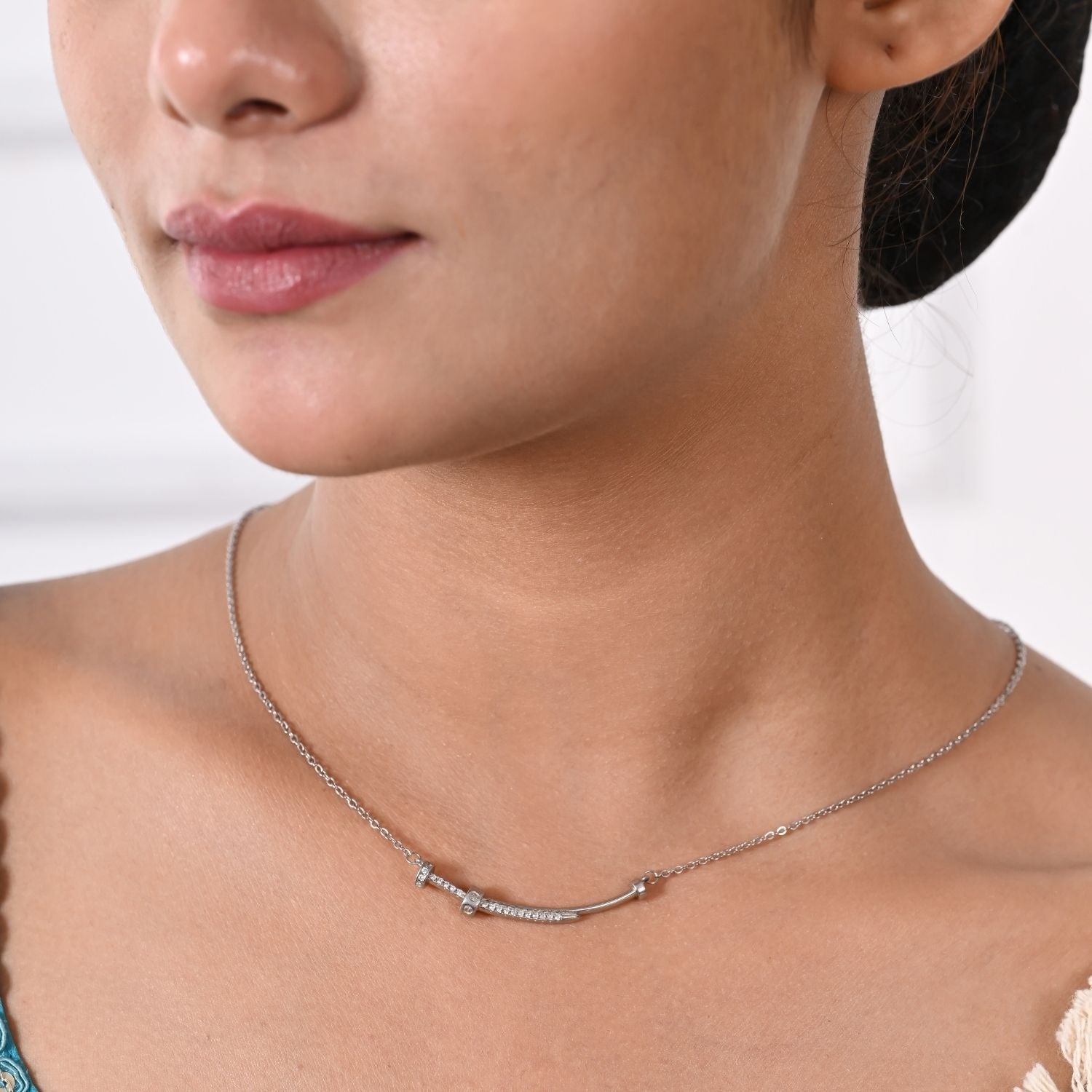 Barbell-inspired pendant necklace