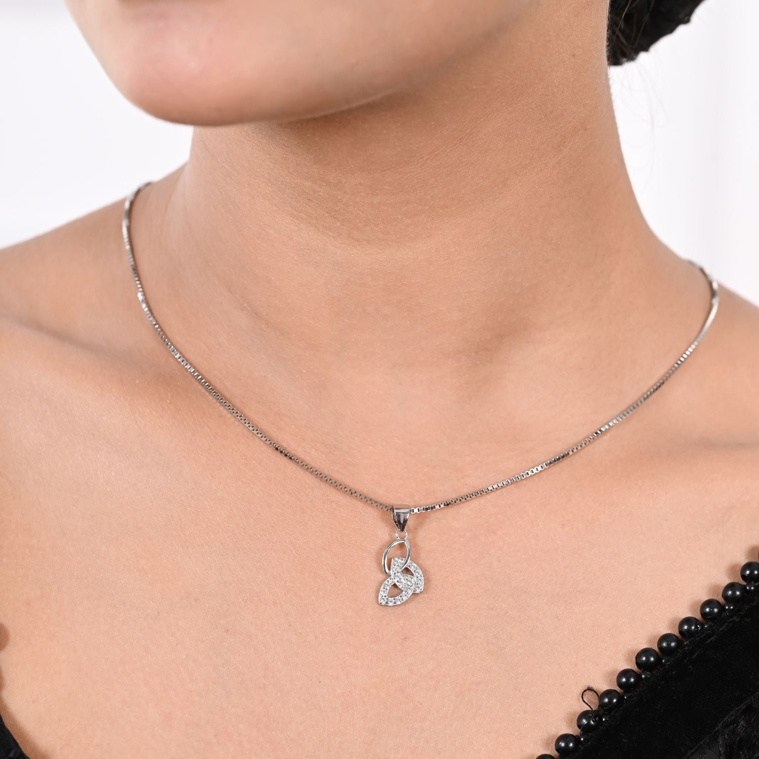 Heart-knot pendant and earring set