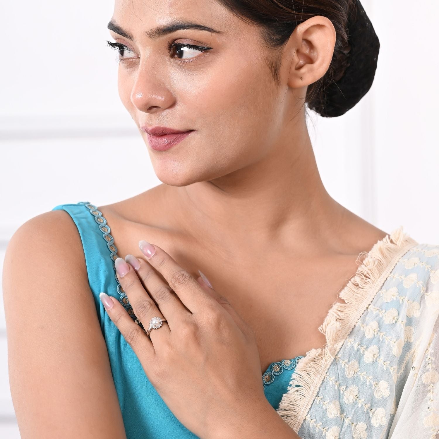 Pearl halo floral ring